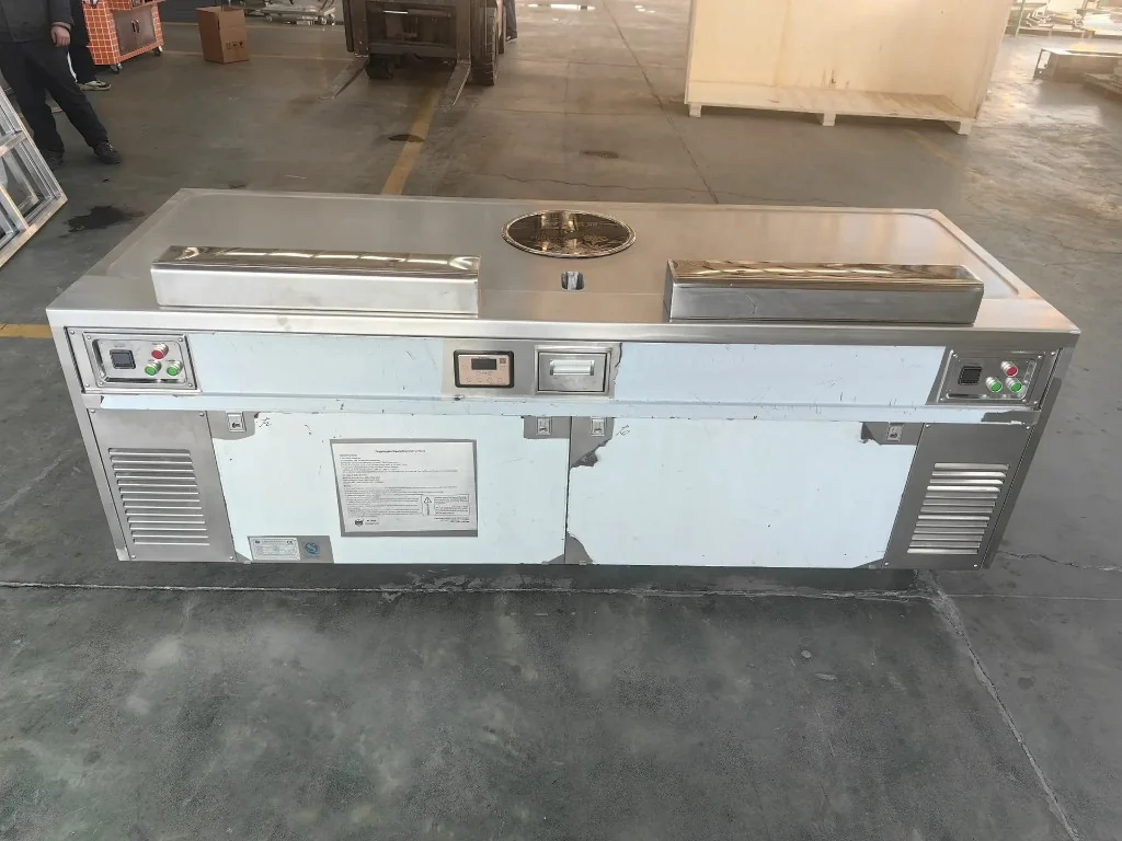 Long stainless teppanyaki workstation with front controls and lower ventilation grilles