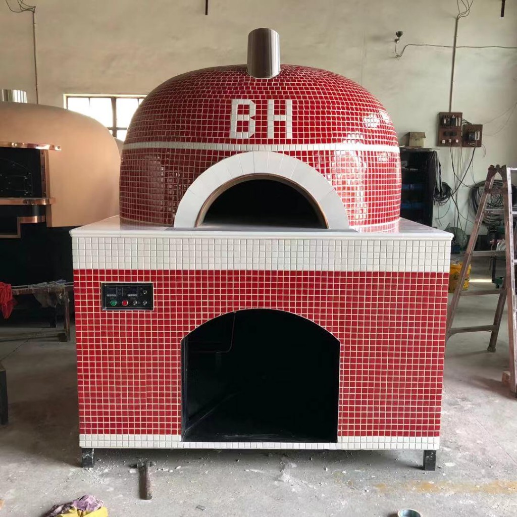 Outdoor wood fired and gas powered pizza oven with lava stone deck on a patio for backyard cooking